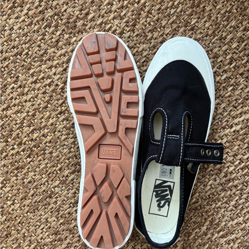 Vans Black and White Slip-On Sneakers